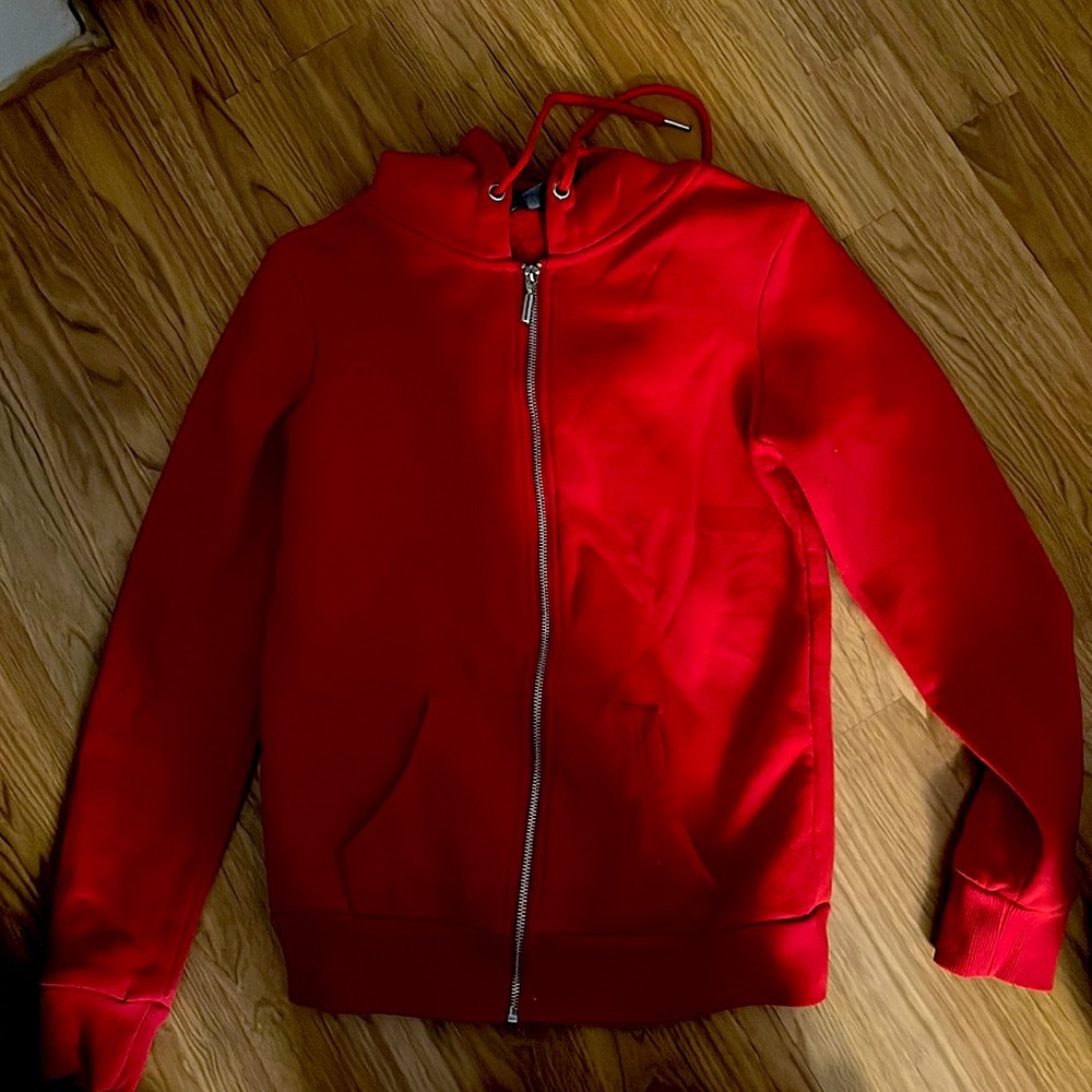 red zip up